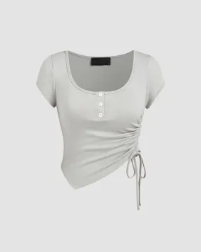 ASYMMETRIC HEM FITTED TOP