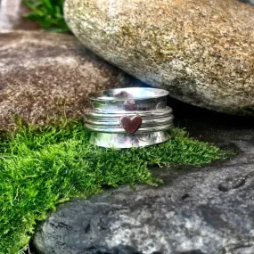 Sterling silver, heart spinner ring. UK size N1/2